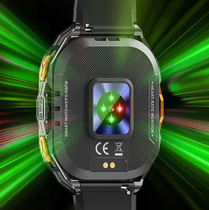 A rugged Aegis X5 GPS Sportswatch with a black textured case and black strap, shown from the back with green and red LED-style screen lighting. The case has printed text including 'SMART WATCH GPS 4GM' and 'HEART RATE MONITOR', set against a dark background with bright green light streaks.