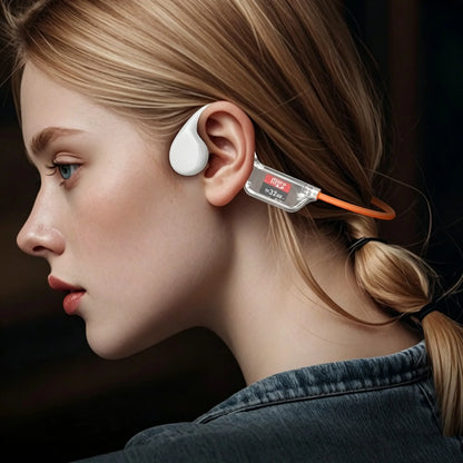 A close-up side profile of a woman wearing a white Audionex Bone Conduction Headphones with a clear and orange inline receiver and cable.