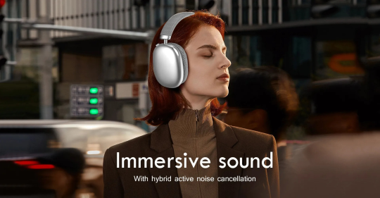 Woman wearing Audionex HiFi Stereo Wireless Headphones with 'Immersive sound' text in a blurred urban setting