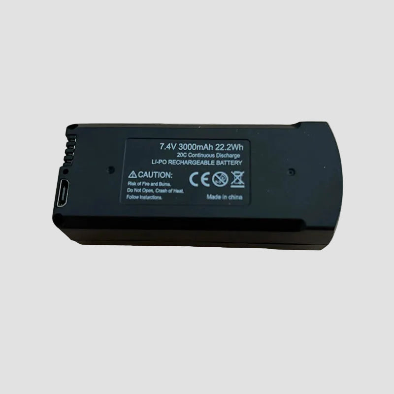 Black battery pack Vassco GPS Drone Battery with label on a wooden surface