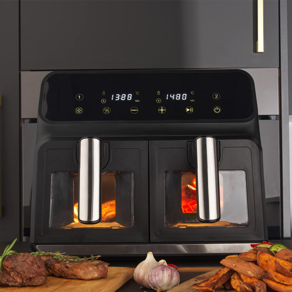 Black Elarvo Air Fryer with digital display on a kitchen counter with food items.