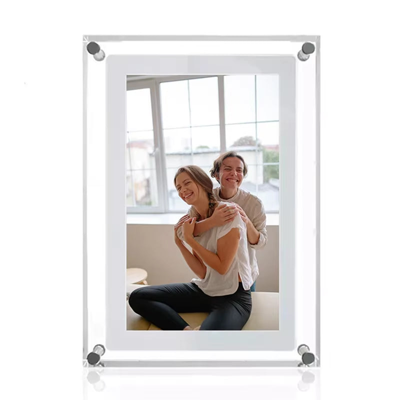White CaptiPix Digital Photo Frame with a couple hugging inside, on a white background