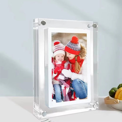 CaptiPix Digital Photo Frame with a picture of two people wearing winter hats and scarves.