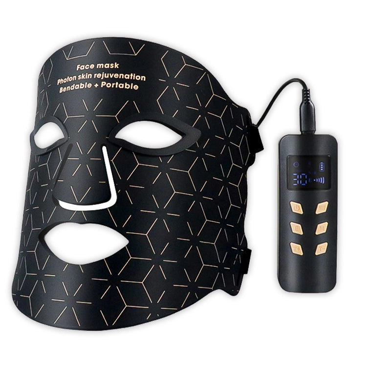 Black Cavinoo LED Mask with geometric pattern and power adapter on a white background