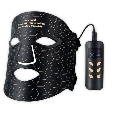 Black Cavinoo LED Mask with geometric pattern and power adapter on a white background