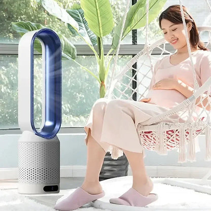 Woman sitting in a hammock next to a Dyson CoolLyxi Bladeless Fan.