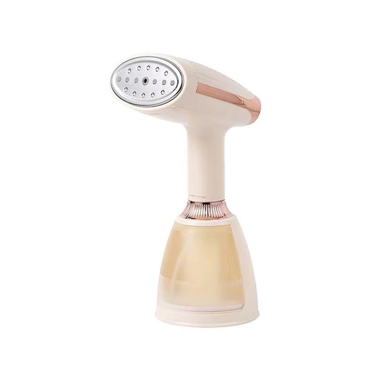 CriisMist Handheld Steamer with beige and rose gold design on a white background