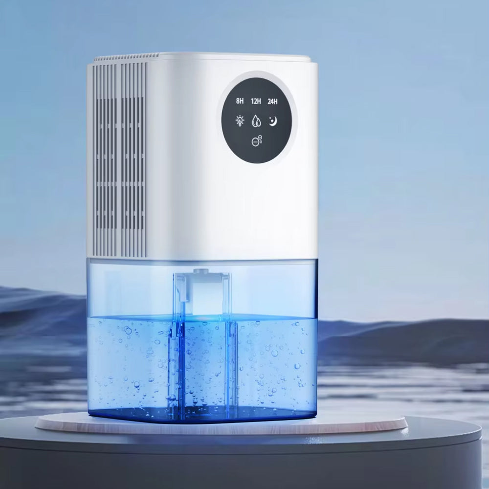 DryZon Dehumidifier with water tank on a blurred landscape background