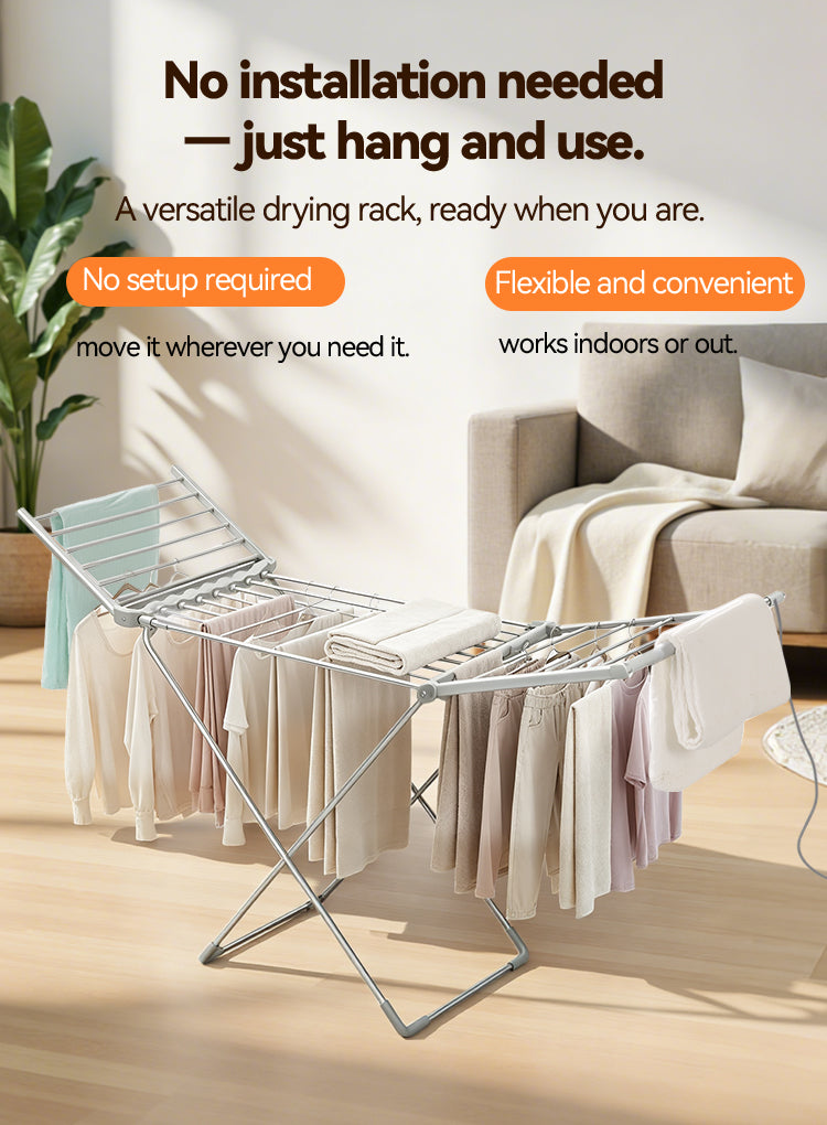 A silver metal Elarvo Heated Clothes Airer dryer rack shown in a living room setting, draped with folded white and light-colored garments. The image includes marketing text at the top stating 'No installation needed — just hang and use.