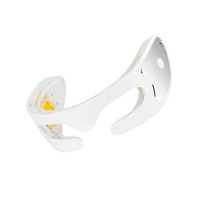 White Eyviola Eye Massager with a yellow component on a white background