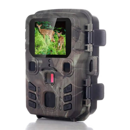 Camouflage-patterned FaunPeak Wildlife Camera with screen displaying deer in grass on a white background