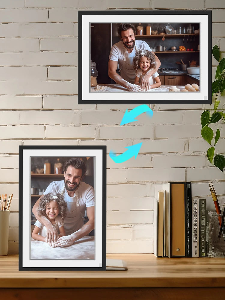 Two Fawnstech Digital Photo Framed photographs of a man and child on a wooden shelf against a light brick wall.