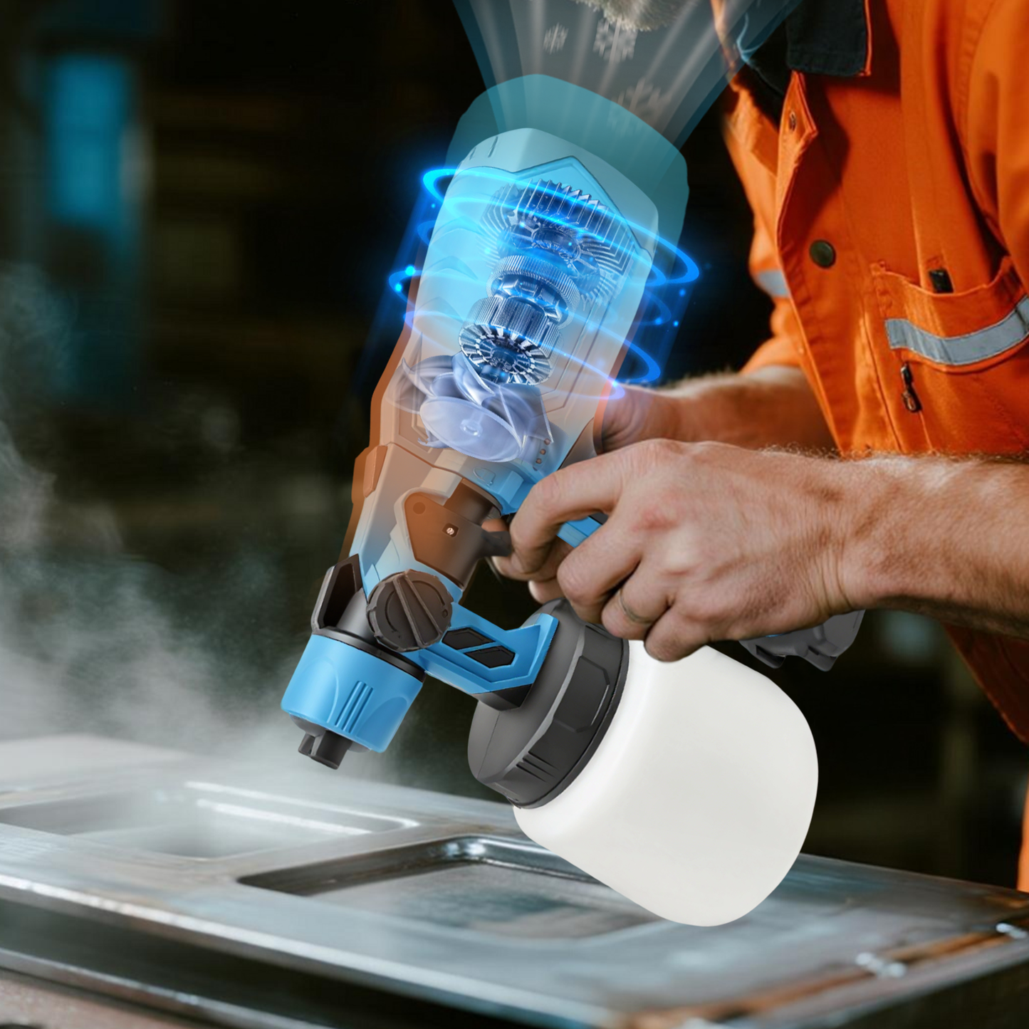 Person using a Geekik Cordless Paint Sprayer on a metal surface with a dark background
