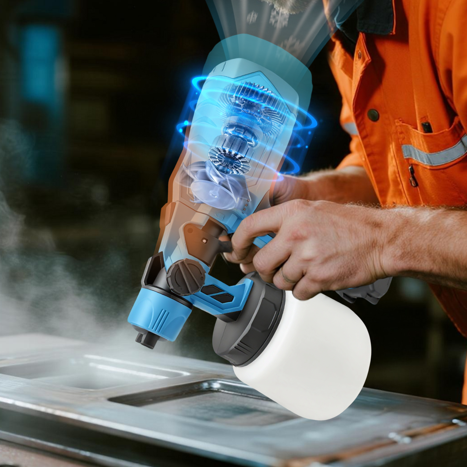 Person using a Geekik Cordless Paint Sprayer on a metal surface with a dark background