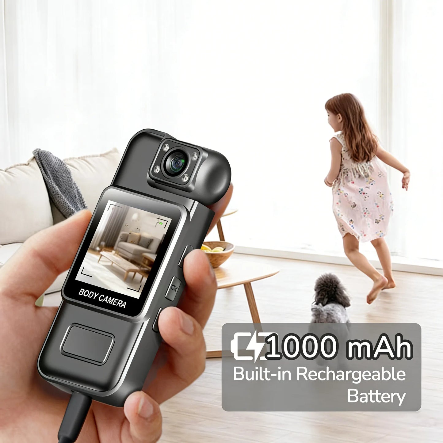 Hand holding a Geekik Mini Body Camera with a child and dog in the background