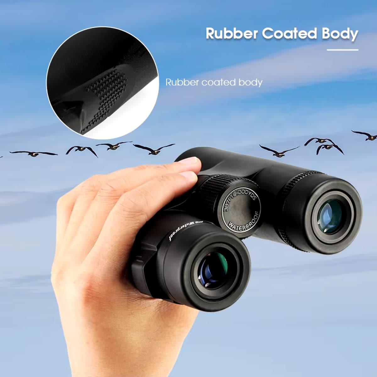 Hand holding HoziSkop Binoculars with rubber-coated body feature, birds in the background