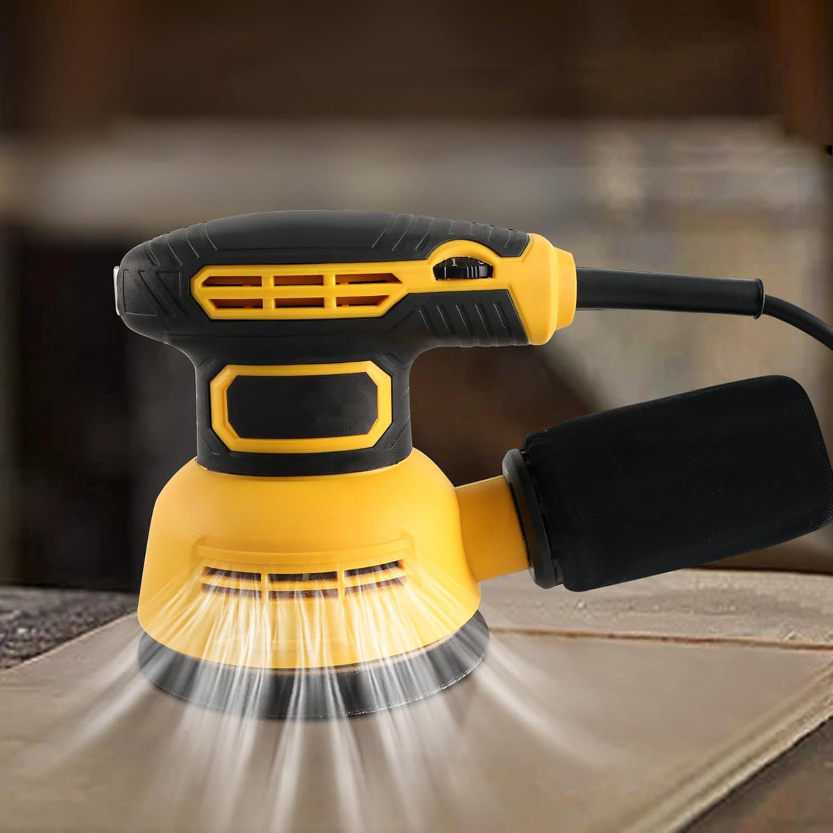 Yellow and black power Kalvori Orbital Sander sanding a wooden surface with a blurred background