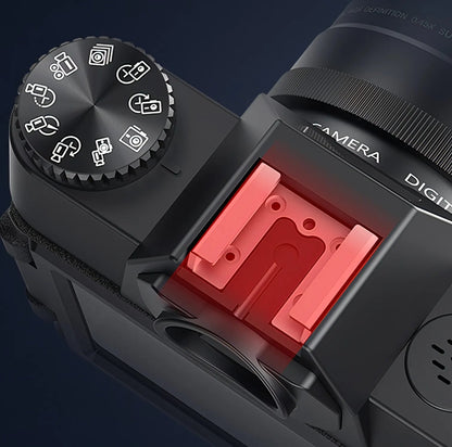 Keovy Digital Camera body with a red flash attachment on a dark background