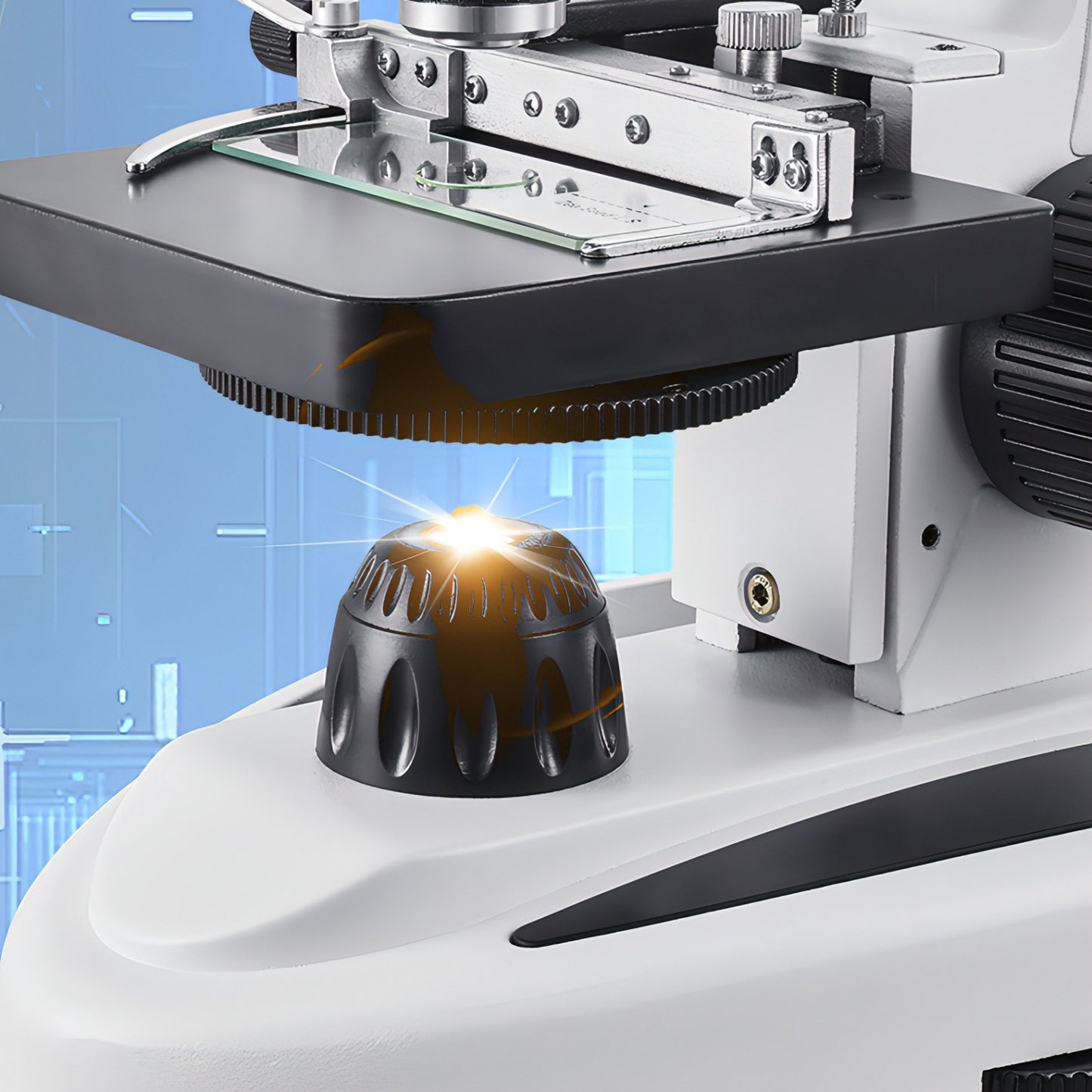 Close-up of a Keovy Microscope component with a blue digital interface in the background