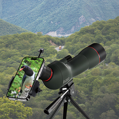 Keovy Spotting Scope with smartphone attachment showing a bird on a mountainous landscape