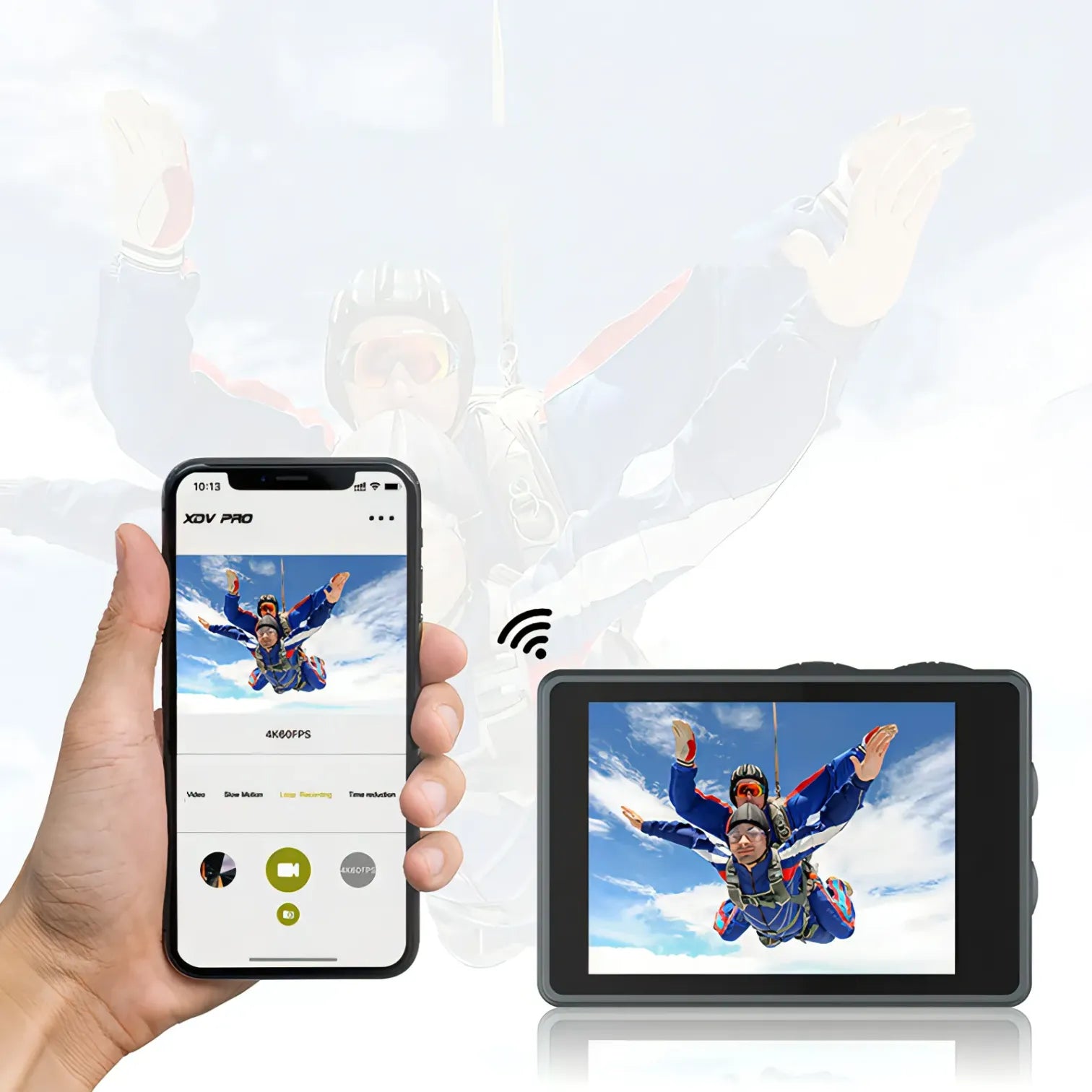 Hand holding a smartphone with a skydiving app and a small Keswo Action Camera displaying a skydiving video.