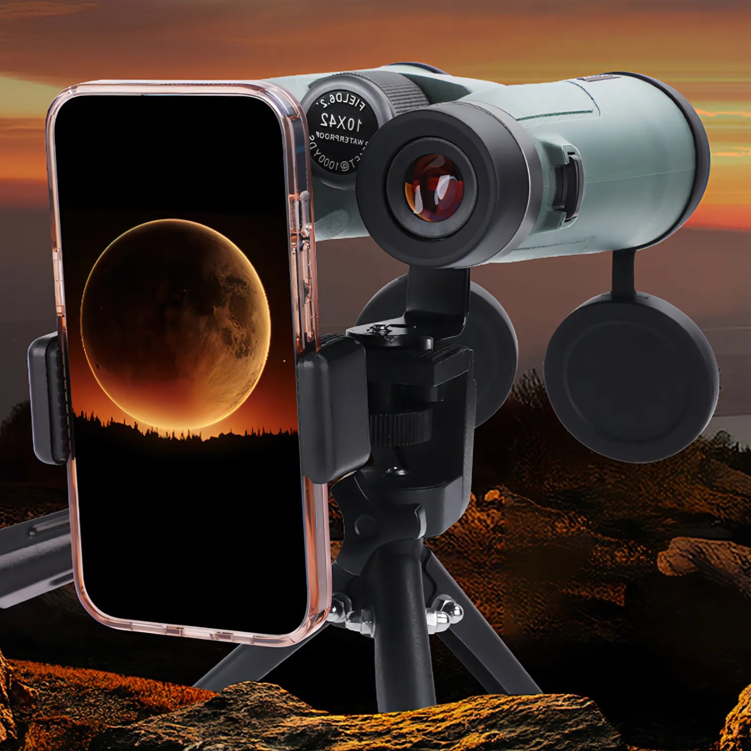 Keswo Binoculars with smartphone displaying moon image against a sunset landscape