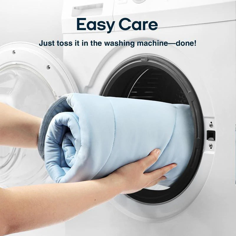 Person placing a folded blue blanket into a washing machine with text 'Easy Care' and 'Just toss it in the washing machine-done!'.
