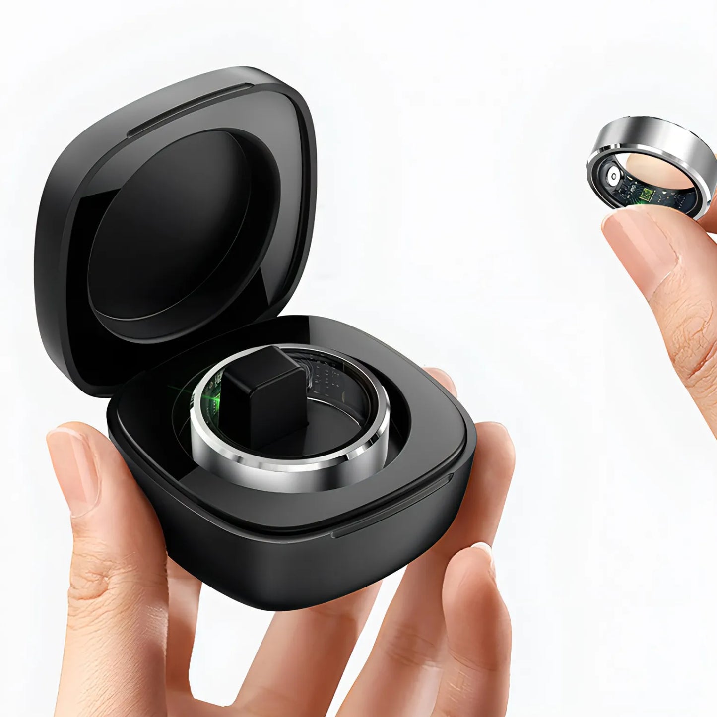 Korons Smart Ring with a black case held by a hand on a white background