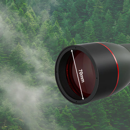 Korons Spotting Scope lens with '70mm' marking against a forest background