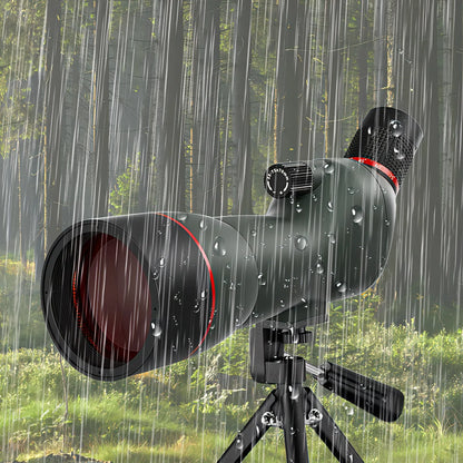 Korons Spotting Scope on a tripod with raindrops against a blurred forest background