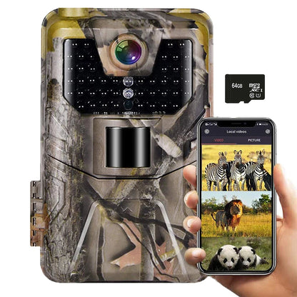 A camouflage MosSnapie Wildlife Camera with a built-in smartphone holder, shown alongside a hand holding a smartphone displaying safari animal photos, and a small 64GB microSD card on a white background.