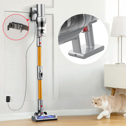 Noventrixa Vacuum Cleaner with attachments on a wooden floor, wall-mounted vacuum cleaner, and cat in the background.