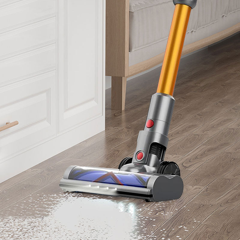 Stick Noventrixa Vacuum Cleaner a wooden floor in a room with white walls and a bed.