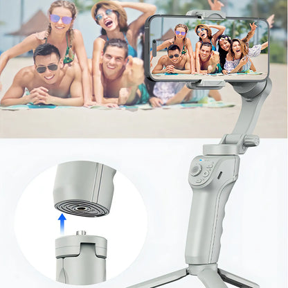 Smartphone held by a Optego Gimbal with a photo of people on the screen, set against a background of people by a pool.