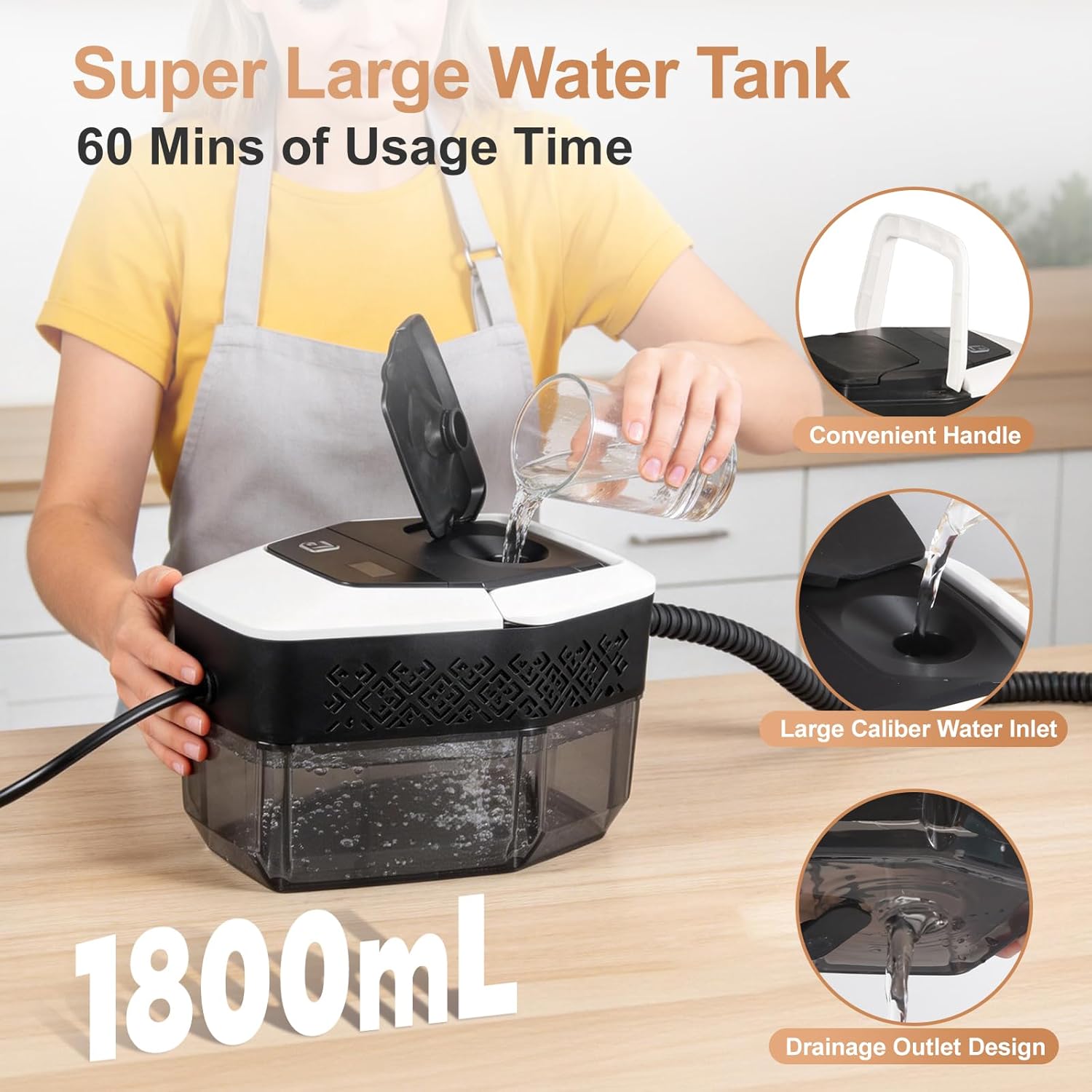 Person using a black and white water tank device with text highlighting features on a wooden surface.