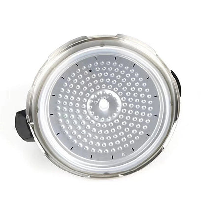 A circular stainless steel mesh filter or strainer basket with a textured surface and small black measurement markings, shown on a plain white background.