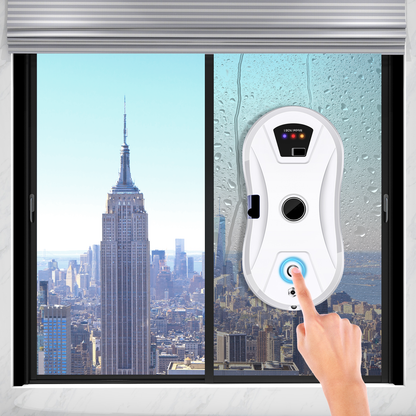 Hand pressing a button on a Purco Window Cleaning Robot V3 with a cityscape background