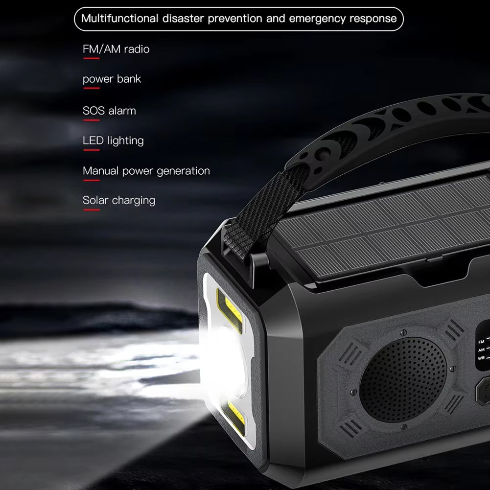 Multifunctional emergency Radiflix Wind Up Radio with solar panel and flashlight on a dark background