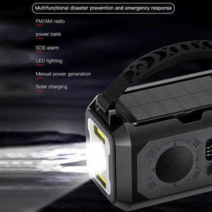 Multifunctional emergency Radiflix Wind Up Radio with solar panel and flashlight on a dark background