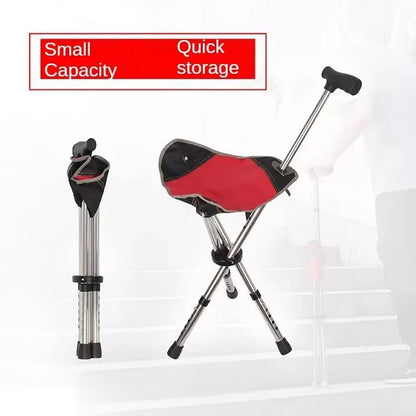 Red and black Restixi Walking Stick with legs extended on a white background