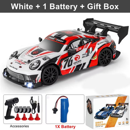 White remote control SkidFlux RC Drift Car with red and black design, including accessories and battery on a white background.