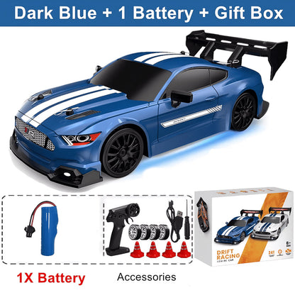 Blue SkidFlux RC Drift Car with remote control, battery, and accessories on a white background