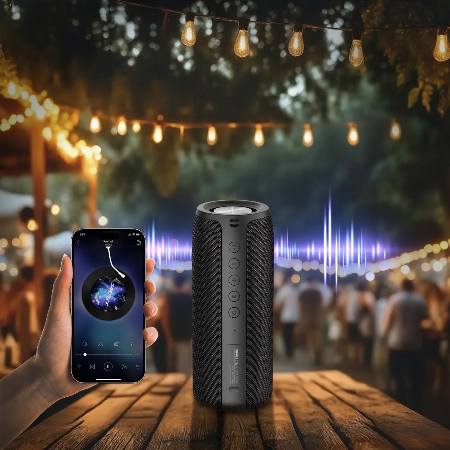 Smartphone and Smaven Portable Bluetooth Speaker on a wooden table with blurred outdoor party background