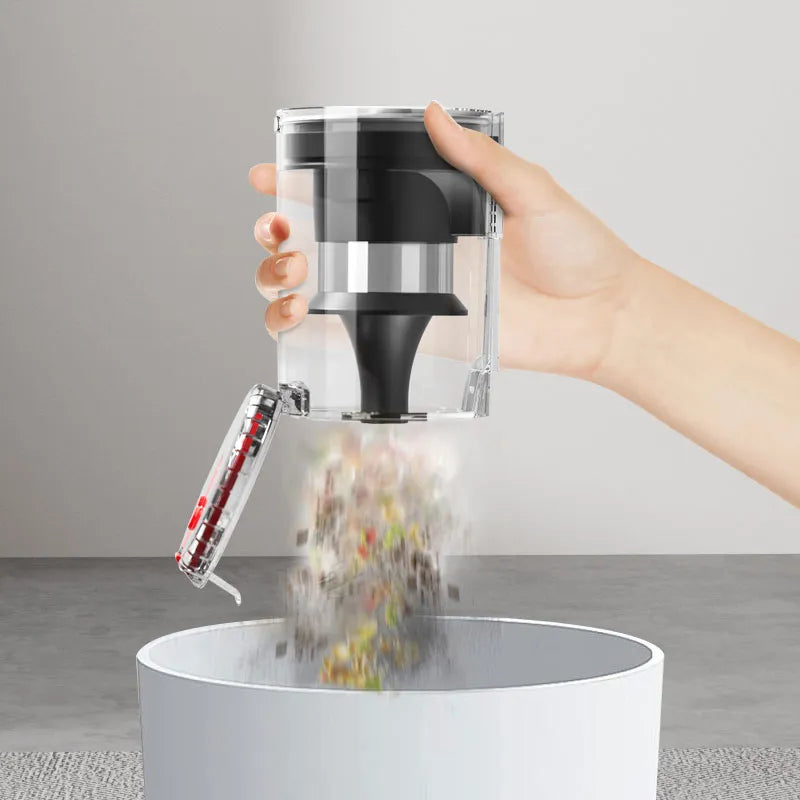 Hand using a Starpod Vacuum Cleaner to sprinkle pepper into a white container on a neutral background