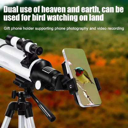 StaryNoxi Telescope with phone holder and birdwatching app on smartphone against a blurred natural background
