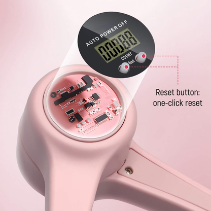 Close-up of a pink Swiftgrid Pelvic Floor Exercise Device with digital display and reset button on a light pink background