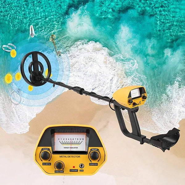 Yellow TeroTera Metal Detector on a beach with ocean waves in the background