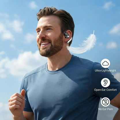 Man wearing a Truevista AI Translation Earbuds with a clear blue sky background