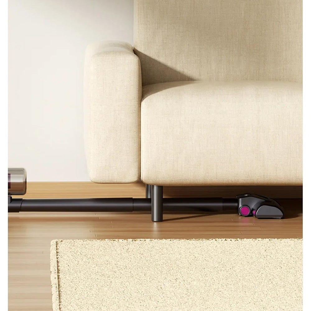 Beige sofa with a VaciMatri Mattress Vacuum Cleaner on a wooden floor