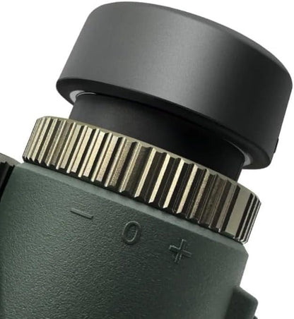 Close-up of a black and green Valisus Binoculars lens with a focus wheel on a white background